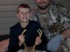 Second generation cousin Jace with his first buck, nice 4 point, and proud papa Chad